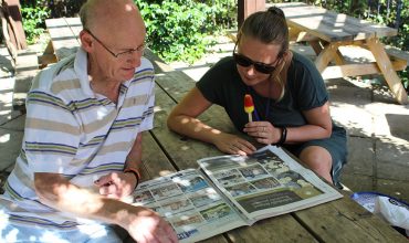 A carer sharing an activity outdoors