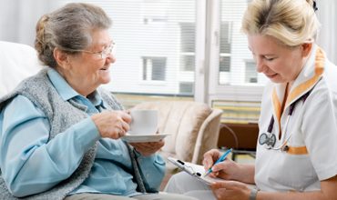 A carer spending time with a client